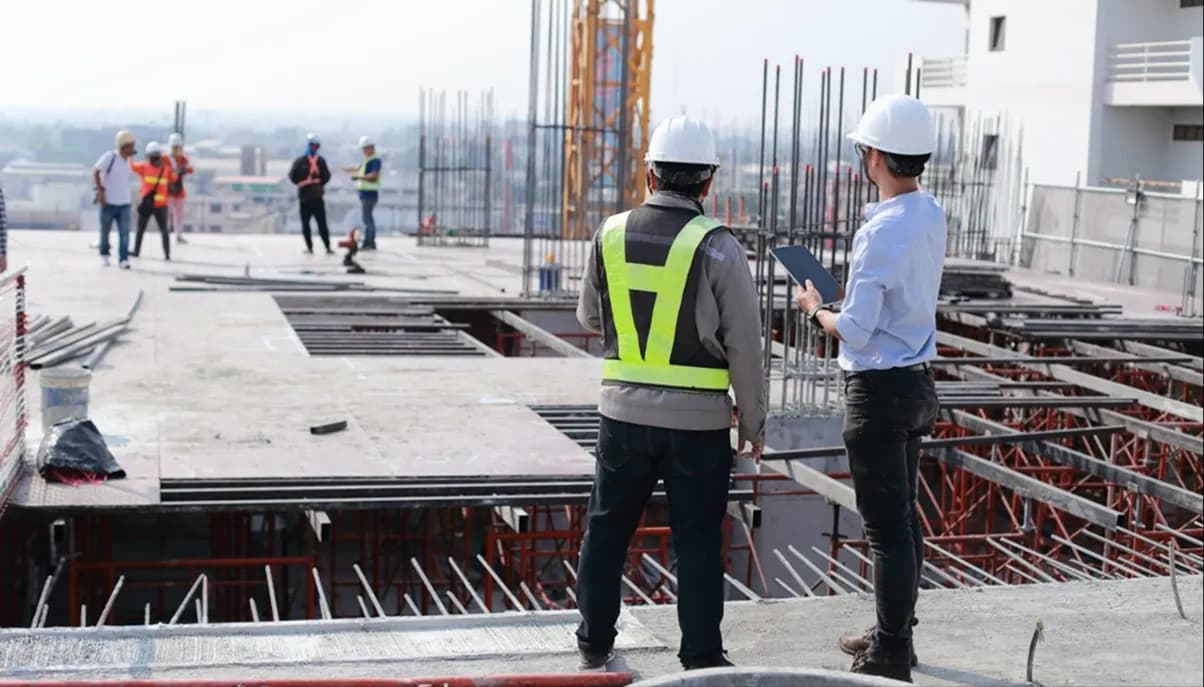 Engineers supervising building systems work