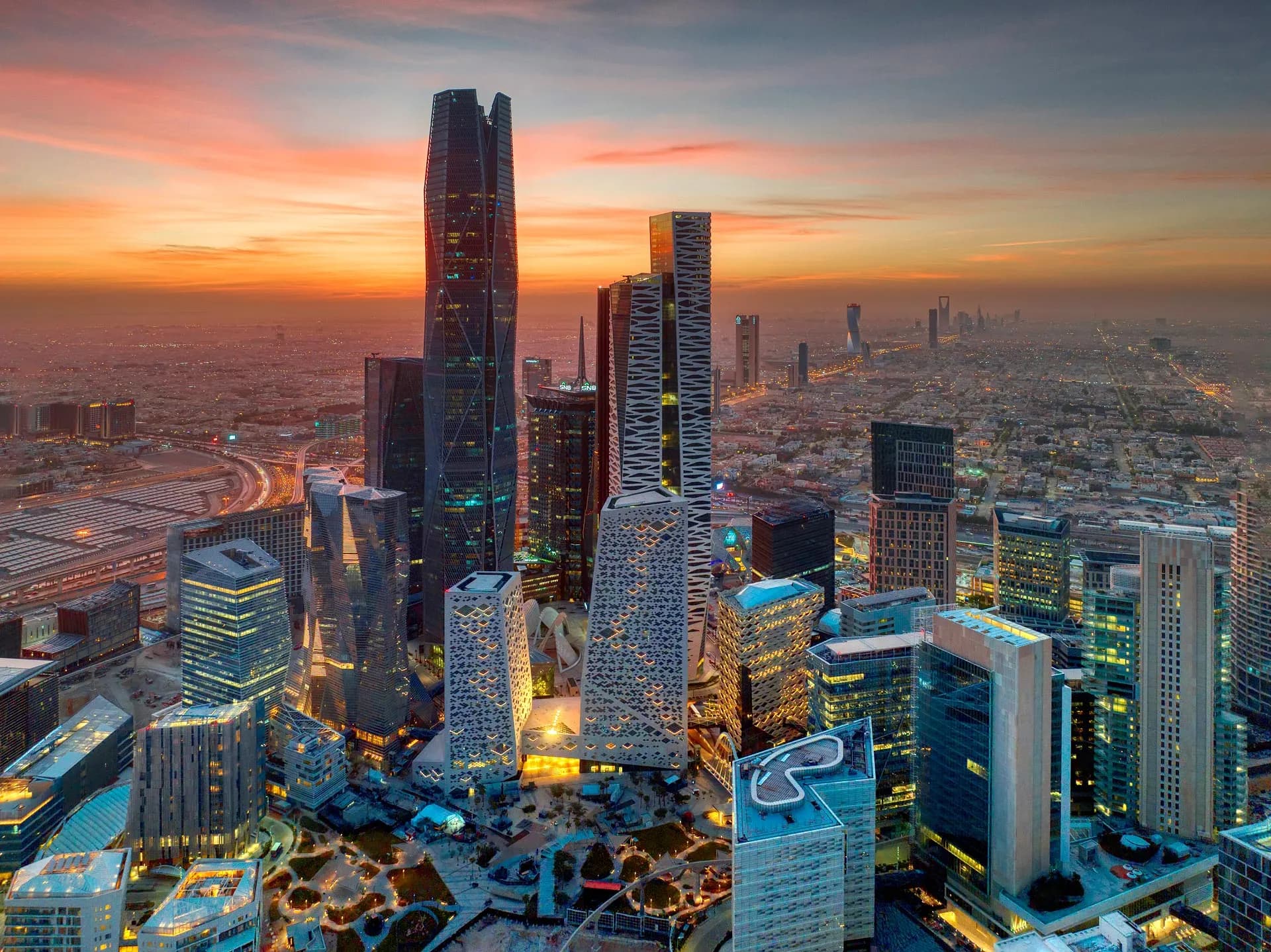 King Abdullah Financial District towers in Riyadh at dusk, symbolizing the Kingdom's urban renaissance