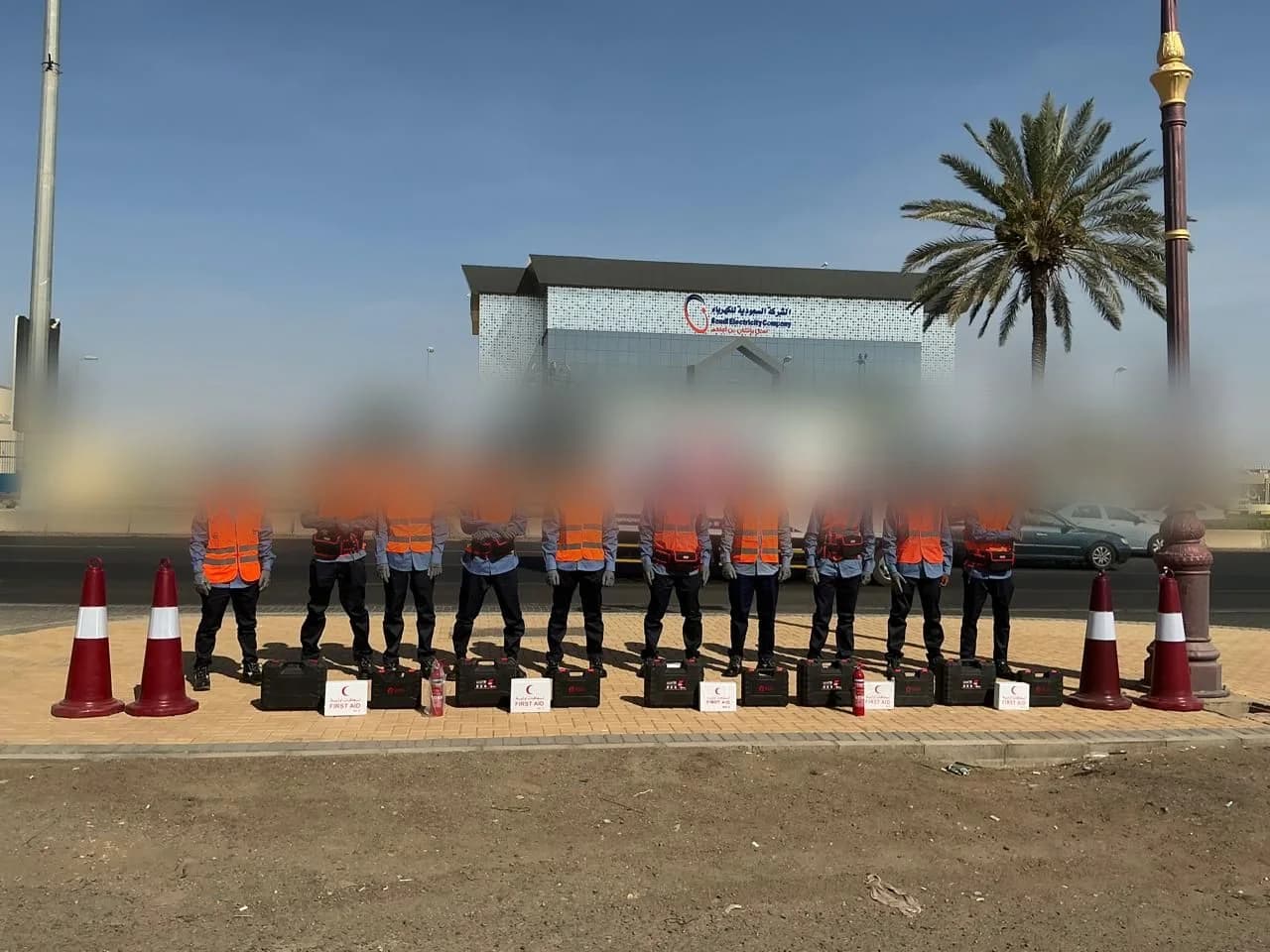 Crew mobilization in front of a Saudi Electricity Company facility