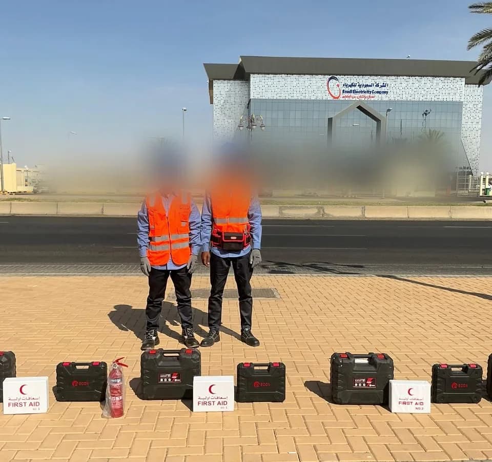 Crew with safety and first-aid equipment on site